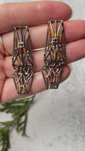 Load and play video in Gallery viewer, Statement Double Dangling Openwork Earrings
